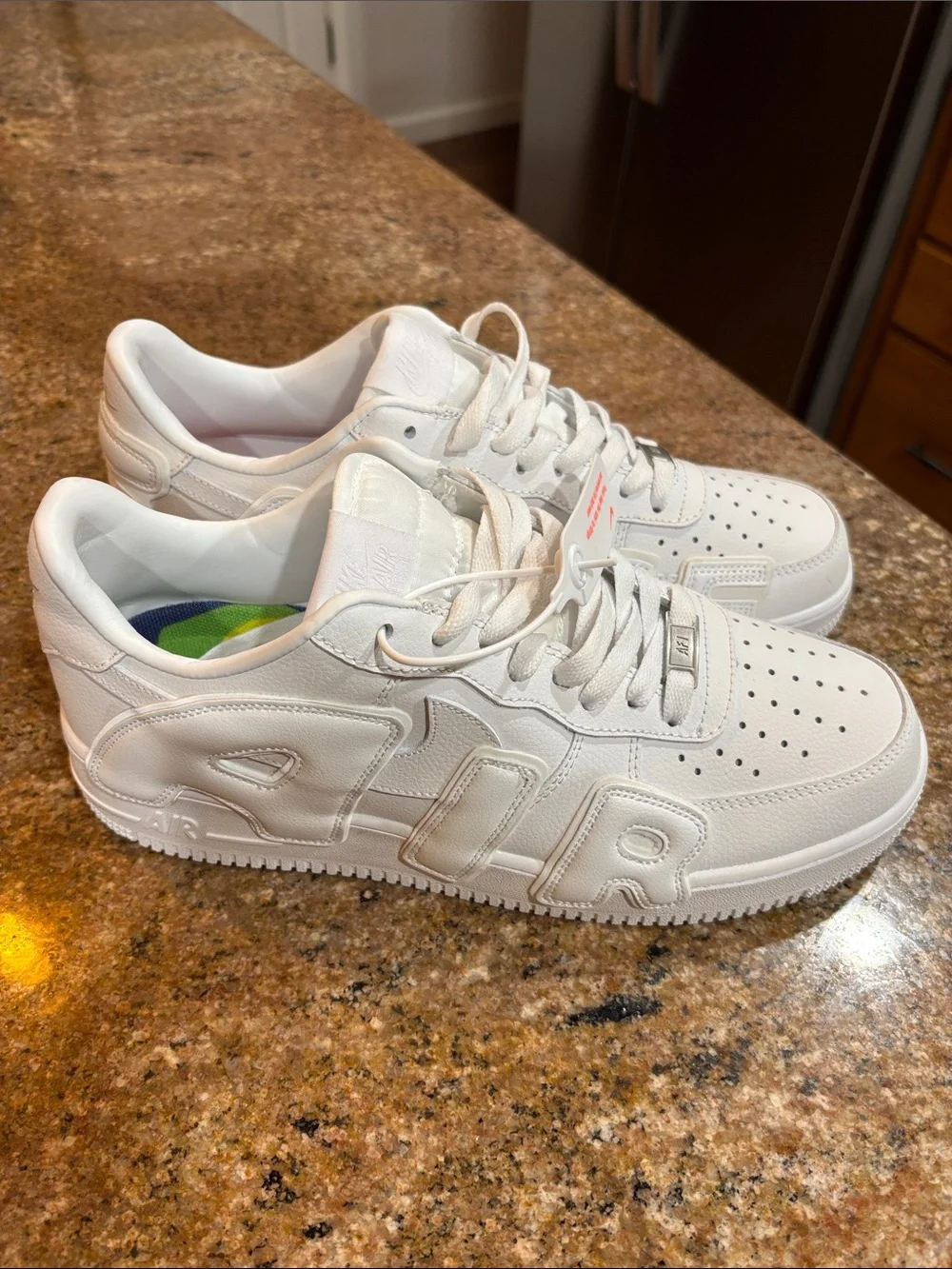 All-White Embossed Low-Top Sneakers